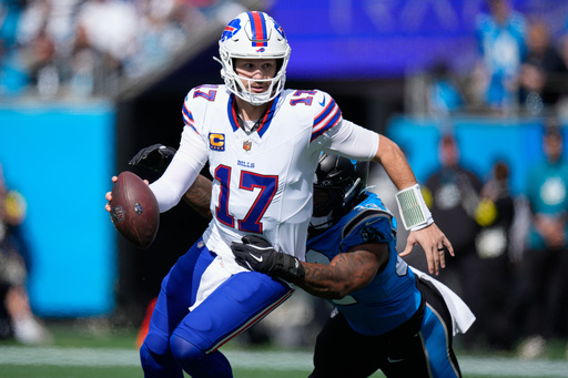 Carolina Panthers linebacker Trevin Wallace (32) sacks Buffalo Bills quarterback Josh Allen (17) during the first half an NFL football game, Sunday, Oct. 26, 2025, in Charlotte, N.C. (AP Photo/Jacob Kupferman) Carolina Panthers linebacker Trevin Wallace (32) sacks Buffalo Bills quarterback Josh Allen (17) during the first half an NFL football game, Sunday, Oct. 26, 2025, in Charlotte, N.C. (AP Photo/Jacob Kupferman)