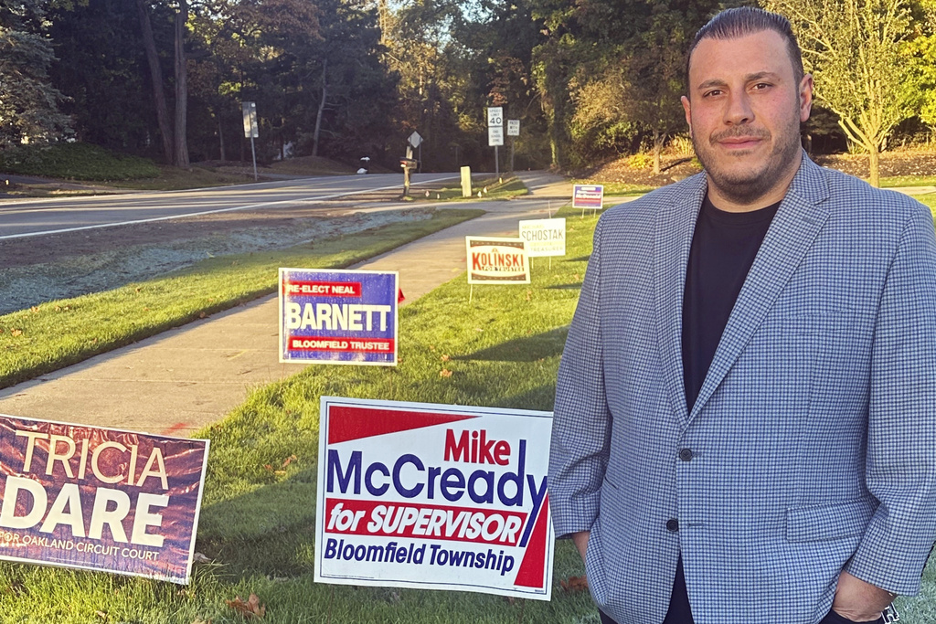 In part of swing state Michigan, neighbors skip presidential signs in a