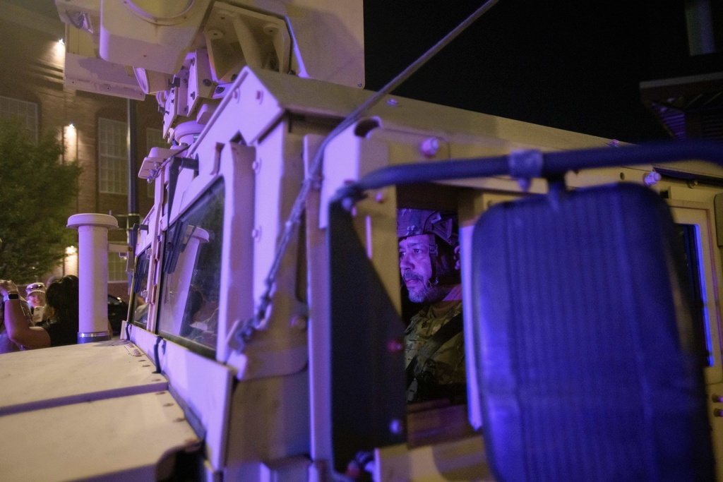 A member of the District of Columbia National Guard prepares to depart their position across Audi Field following an MLS soccer game between D.C. United and Inter Miami CF in Washington, Saturday, Aug. 23, 2025. (AP Photo/Rod Lamkey, Jr.)