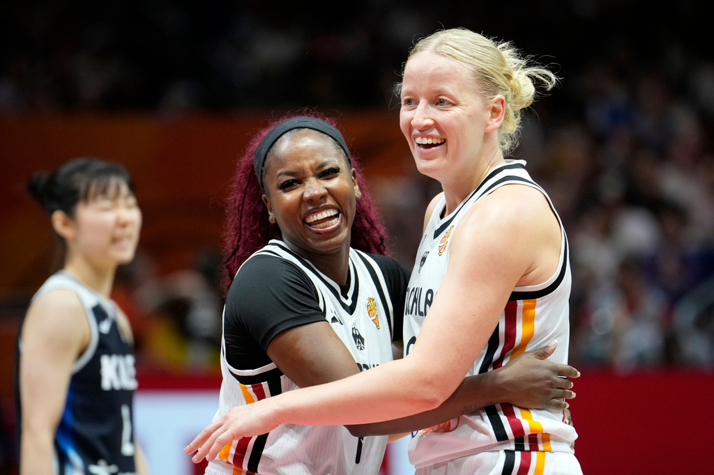 Germany's Alexis Peterson and Emma Eichmeyer during the Women's Basketball World Cup qualification playoff between Germany and Korea in Berlin, Tuesday, Sept. 8, 2026. (AP Photo/Ebrahim Noroozi)