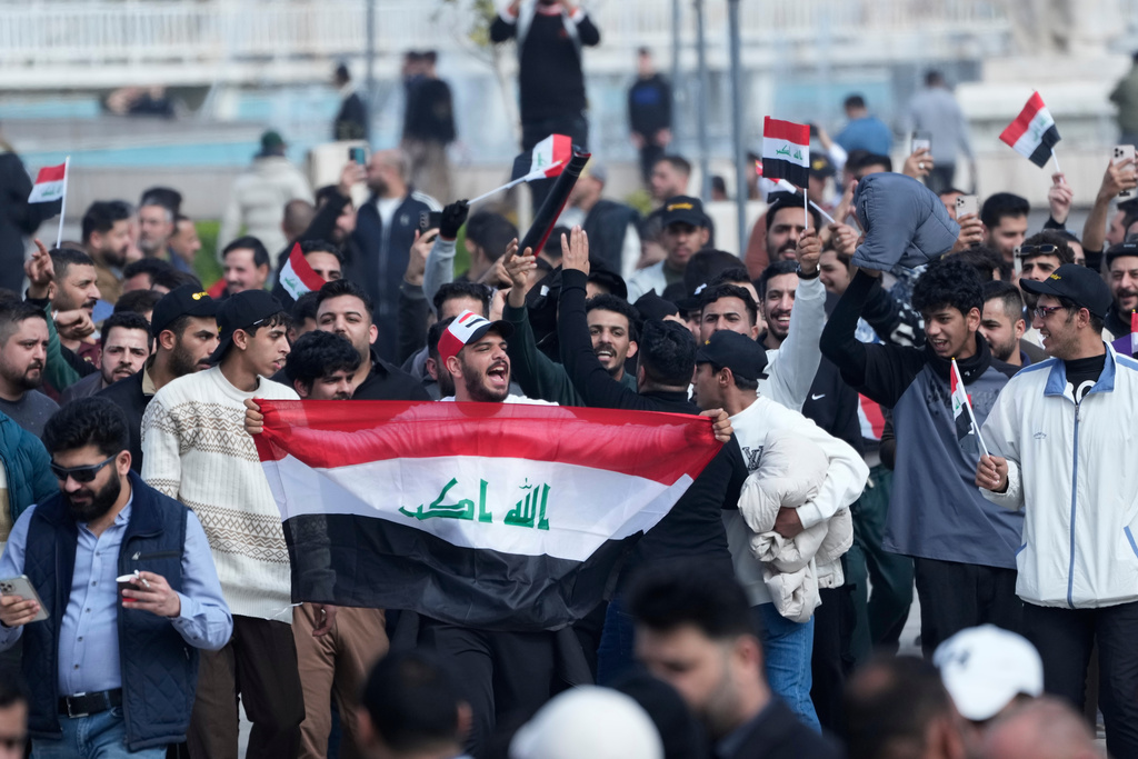 Iraqi traders protest against the imposition of customs duties on imported goods in Baghdad, Iraq, Sunday, Feb. 8, 2026. (AP Photo/Hadi Mizban)