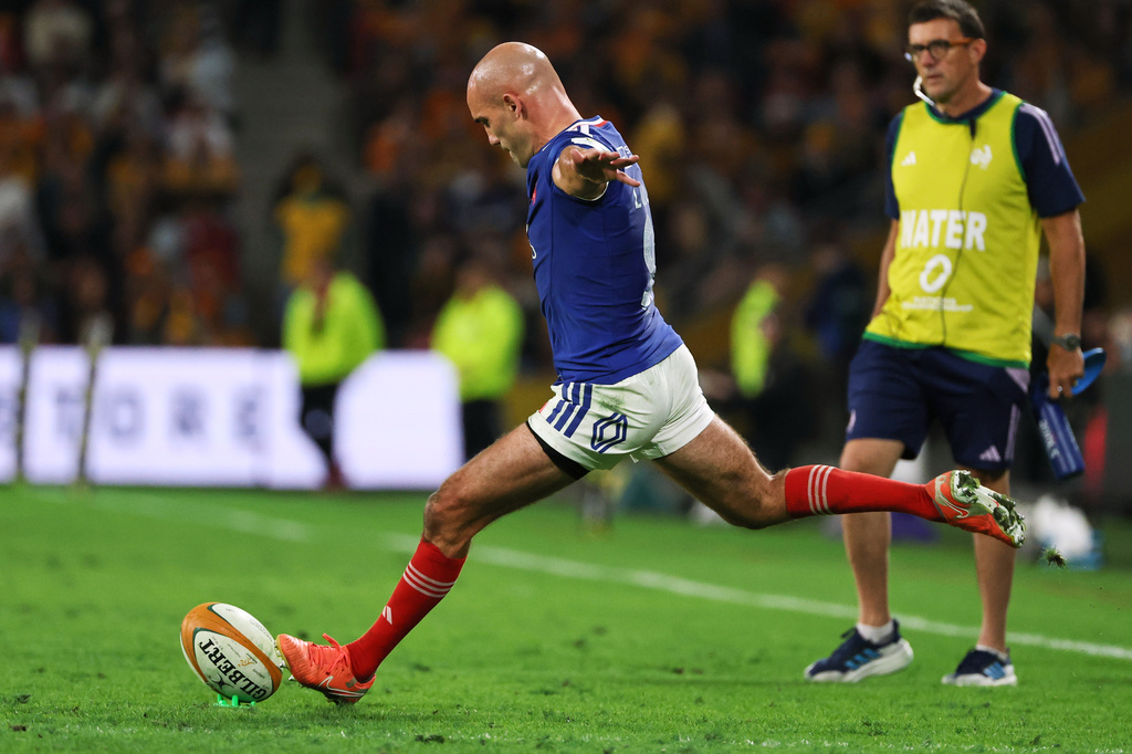 France's Maxime Lucu takes a shot at goal during the Nations Championship rugby international between France and Australia in Brisbane, Australia, Saturday, July 11, 2026. (AP Photo/Tertius Pickard)
