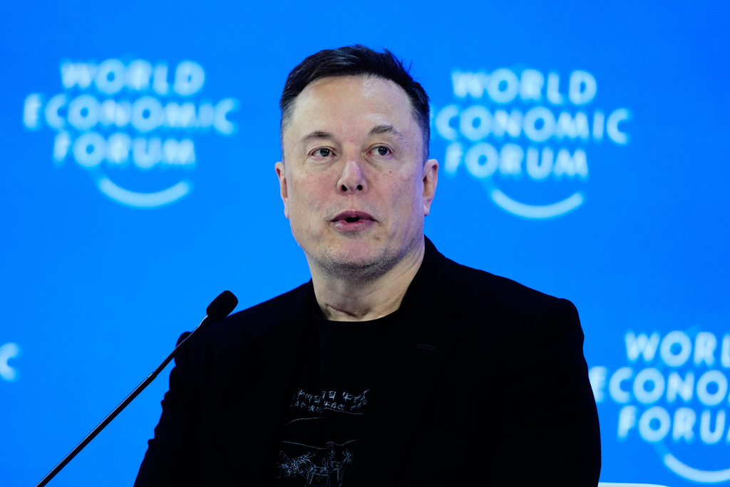 FILE - Elon Musk attends the annual meeting of the World Economic Forum in Davos, Switzerland, Jan. 22, 2026. (AP Photo/Markus Schreiber, File)