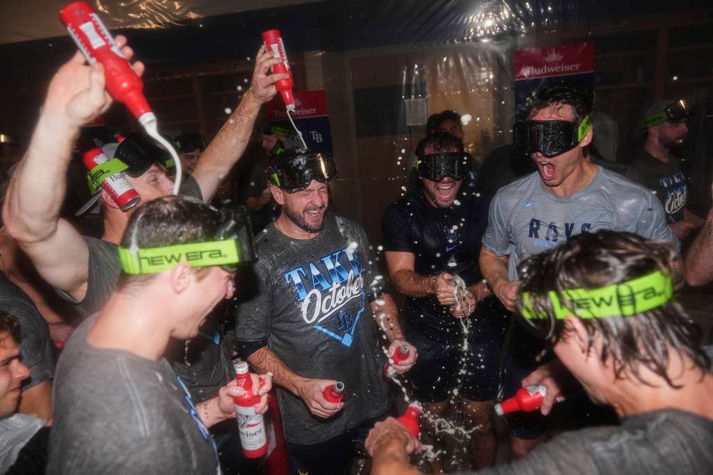 The Tampa Bay Rays celebrate the team's win in Game 3 of baseball's American League Division Series against the New York Yankees, Wednesday, Oct. 7, 2026, in New York. (AP Photo/Seth Wenig)