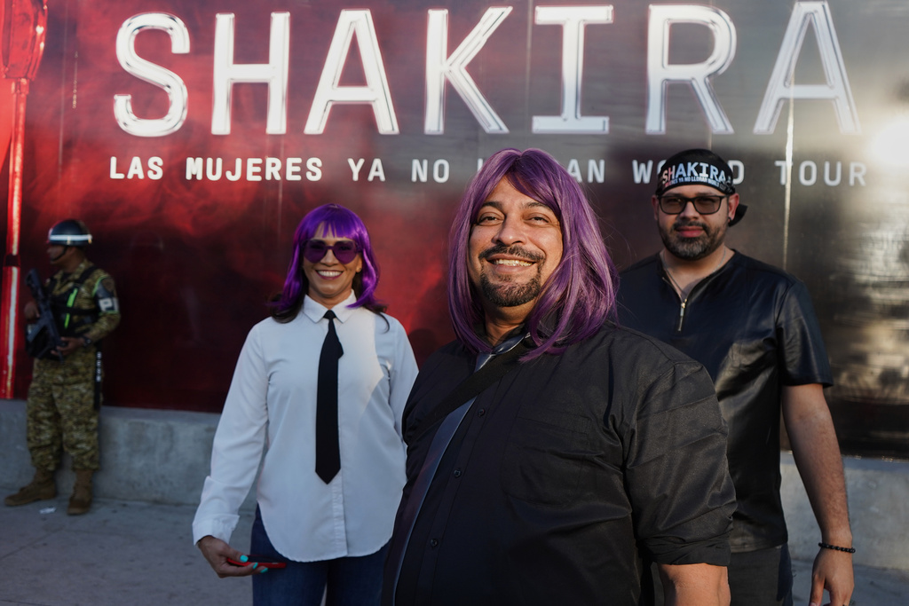 Honduran fans of Colombian pop star Shakira pose for a photo before her concert at the National Stadium in San Salvador, El Salvador, Thursday, Feb. 12, 2026. (AP Photo/Salvador Melendez)