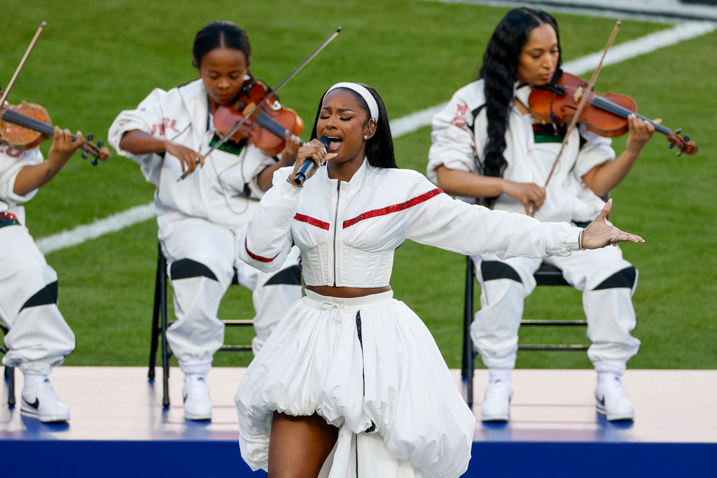 Grammy Award-winner Coco Jones performs "Lift Every Voice and Sing" during pregame festivities for Super Bowl LX between the Seattle Seahawks and the New England Patriots in Santa Clara, Calif., Sunday, Feb. 8, 2026. (Scott Strazzante/San Francisco Chronicle via AP)