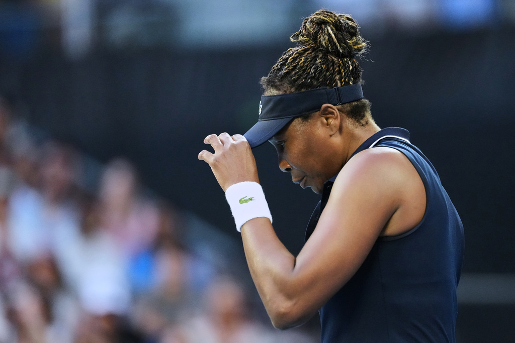Venus Williams of the U.S. reacts during her first round match against Olga Danilovic of Serbia at the Australian Open tennis championship in Melbourne, Australia, Sunday, Jan. 18, 2026. (AP Photo/Aaron Favila)