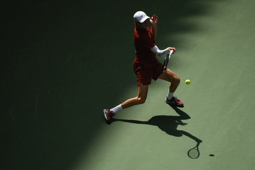 Jannik Sinner, of Italy, returns a shot to Vit Kopriva, of the Czech Republic, during the first round of the U.S. Open tennis championships, Tuesday, Aug. 26, 2025, in New York. (AP Photo/Yuki Iwamura)