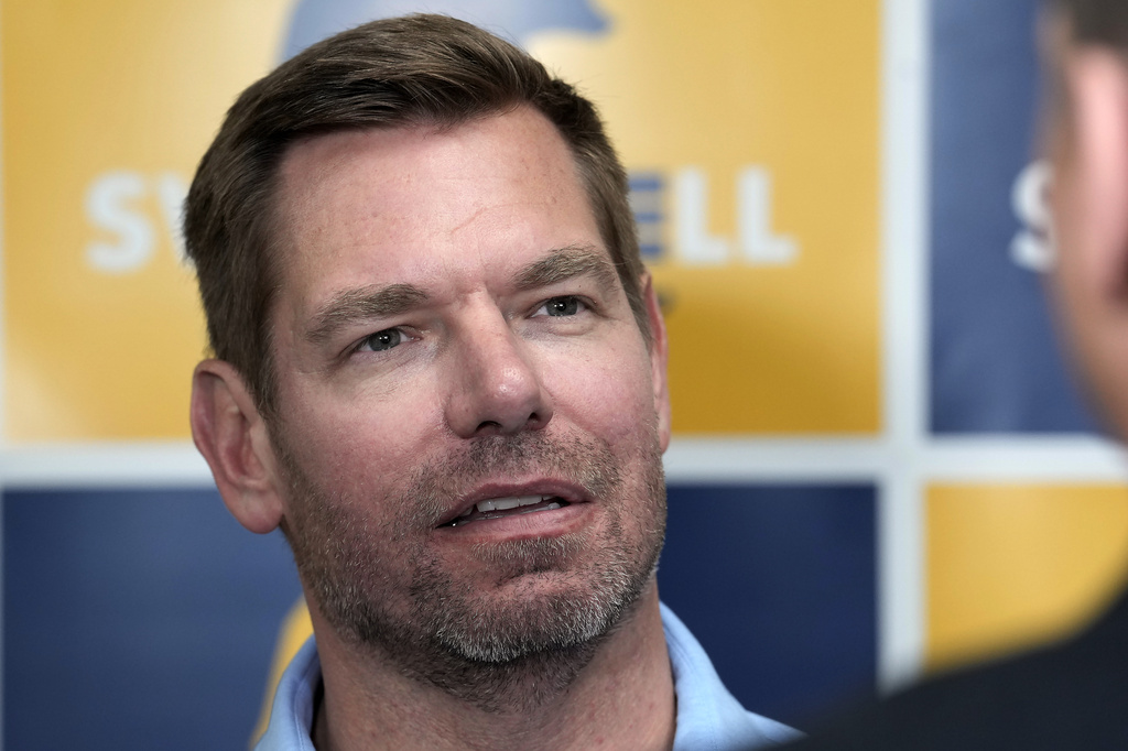 FYI - Rep. Eric Swalwell, D-Calif., talks with reporters after holding a town hall meeting in Sacramento, Calif., April 7, 2026. (AP Photo/Rich Pedroncelli, File)