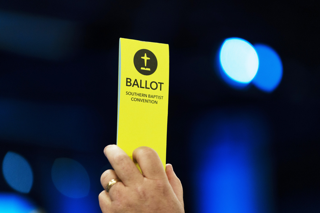 FILE - An attendee holds up a ballot during the Southern Baptist Convention's annual meeting in Anaheim, Calif., Tuesday, June 14, 2022. (AP Photo/Jae C. Hong, File)
