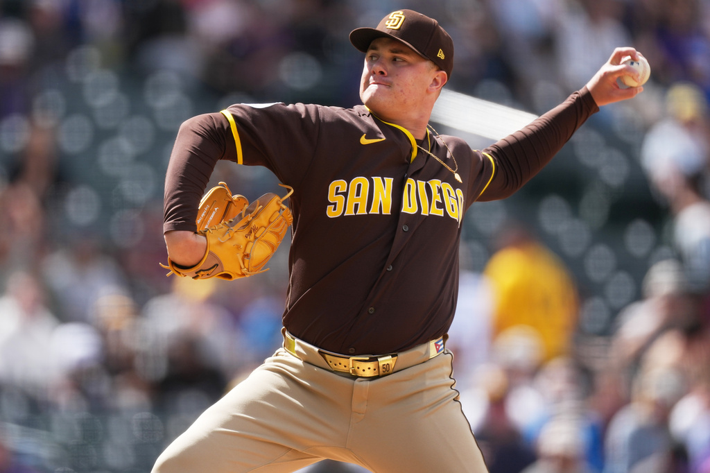 San Diego Padres relief pitcher Adrian Morejon works against the Colorado Rockies in the sixth inning of a baseball game Thursday, April 23, 2026, in Denver. (AP Photo/David Zalubowski)