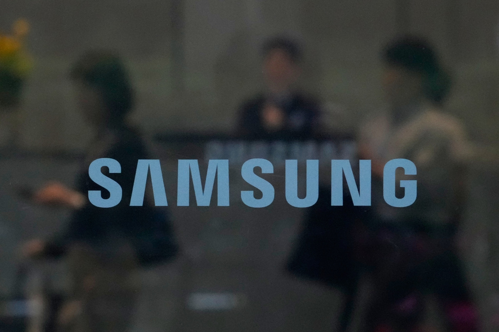 The logo of the Samsung Electronics Co. is seen at its office in Seoul, South Korea, Wednesday, May 20, 2026. (AP Photo/Ahn Young-joon)