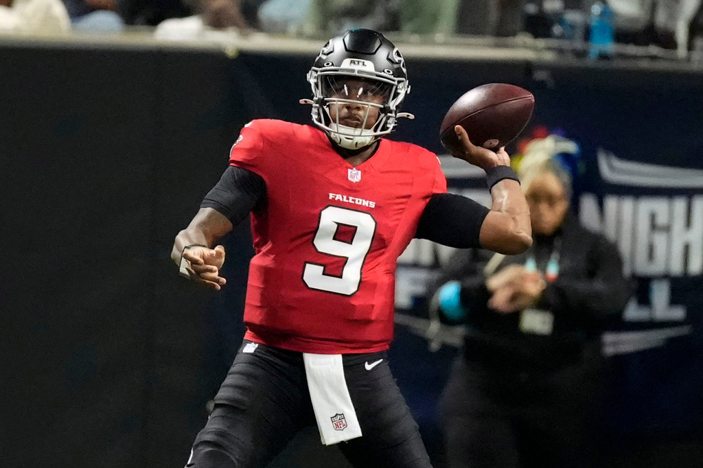 Atlanta Falcons quarterback Michael Penix Jr. throws a pass during the first half of an NFL football game against the Baltimore Ravens, Sunday, Oct. 11, 2026, in Atlanta. (AP Photo/Mike Stewart)