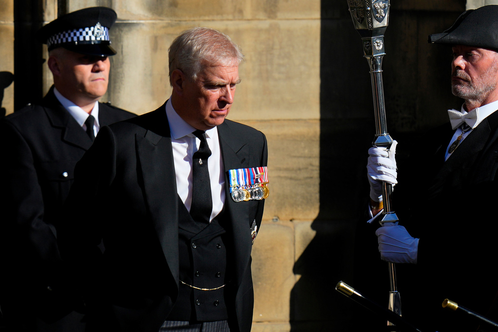FILE - Prince Andrew leaves St. Giles Cathedral after the arrival of the coffin containing the remains of his mother Queen Elizabeth, in Edinburgh, Scotland, Sept. 12, 2022. (AP Photo/Petr David Josek, File)
