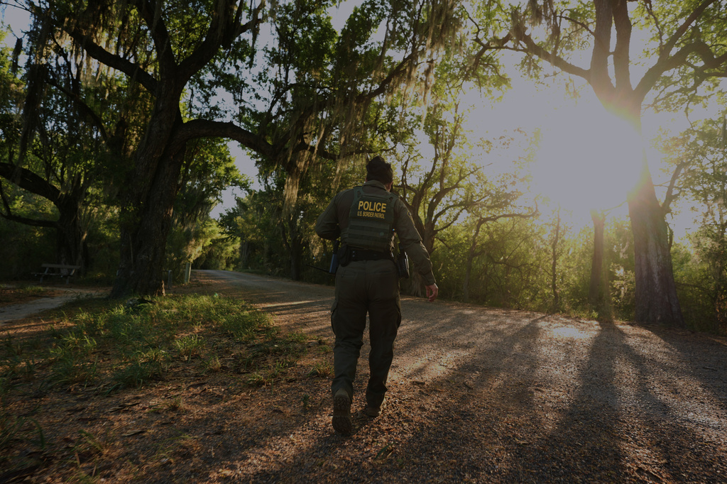 A U.S. Border Patrol agent passes through the Santa Ana Wildlife Refuge in Alamo, Texas, Tuesday, Aug. 25, 2026. (AP Photo/Eric Gay)