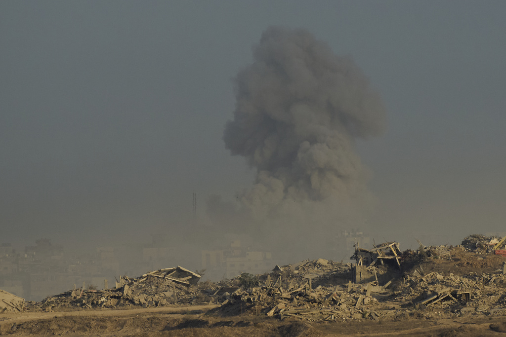 Smoke rises following an explosion in the Gaza Strip, as seen from southern Israel, Sunday, Sept. 21, 2025. (AP Photo/Ohad Zwigenberg)