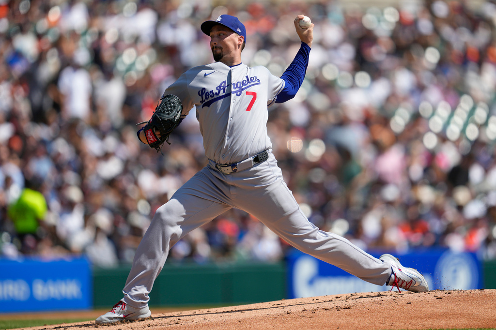 Los Angeles Dodgers pitcher Blake Snell throws against the Detroit Tigers during the first inning of a baseball game Saturday, Aug. 29, 2026, in Detroit. (AP Photo/Paul Sancya)