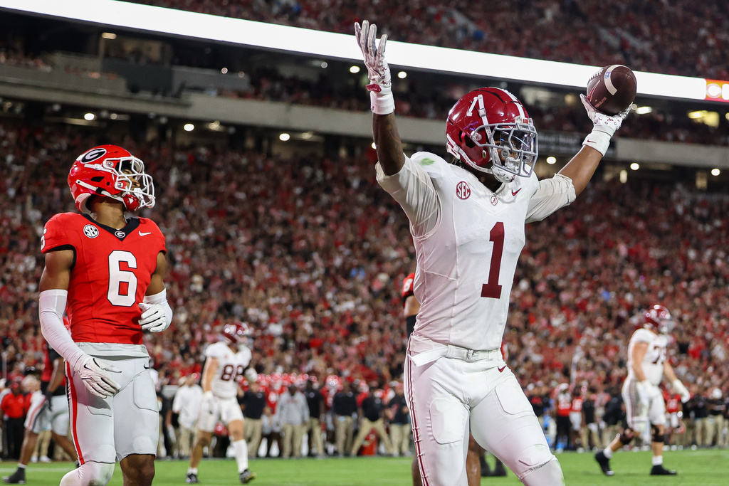 Alabama wide receiver Isaiah Horton (1) reacts after scoring a touchdown in the first half of an NCAA college football game against Georgia, Saturday, Sept. 27, 2025, in Athens, Ga. (AP Photo/Colin Hubbard)