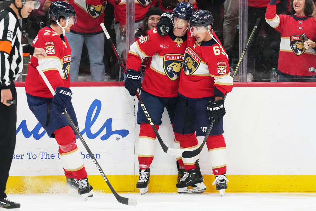 Florida Panthers left wing Brad Marchand (63) celebrates after scoring a goal during the second period of an NHL hockey game against the Dallas Stars, Saturday, Nov. 1, 2025, in Sunrise, Fla. (AP Photo/Lynne Sladky)