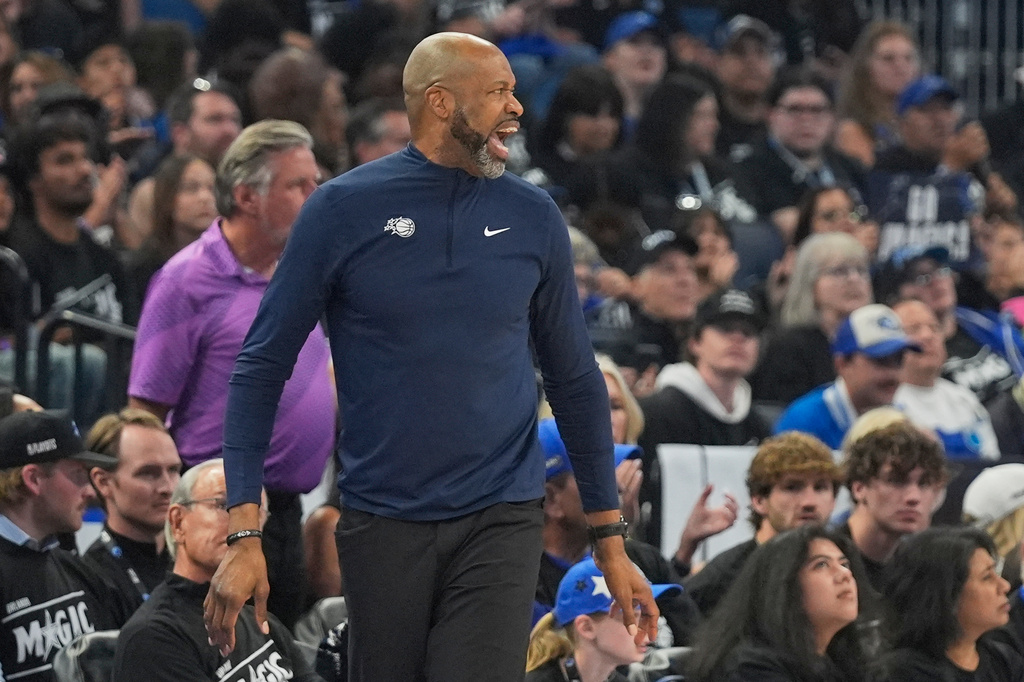 Orlando Magic head coach Jamahl Mosley shouts to players during the second half in Game 3 of a first-round NBA basketball playoff series against the Detroit Pistons, Saturday, April 25, 2026, in Orlando, Fla. (AP Photo/John Raoux)