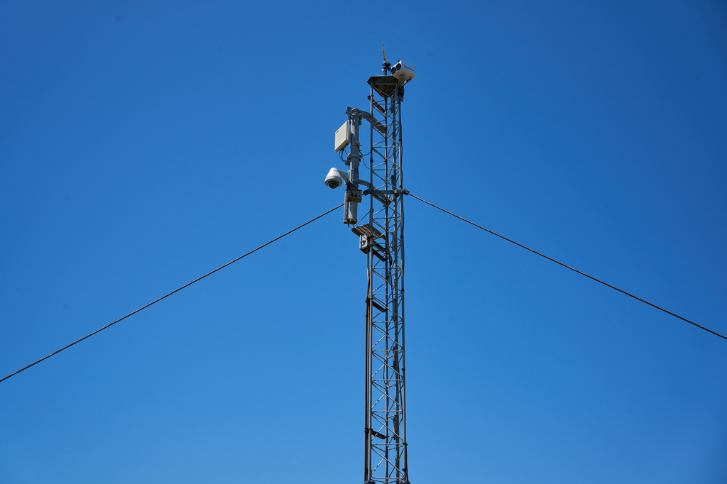 A WhaleSpotter device that scans the bay around the clock for whale blows and heat signatures is mounted on a tower on Angel Island in San Francisco Bay, Tuesday, May 19, 2026. (AP Photo/Annika Hammerschlag)