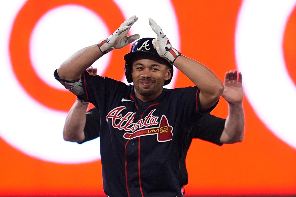 Atlanta Braves' Drake Baldwin celebrates after hitting a double during the fifth inning of a baseball game against the Minnesota Twins Monday, Aug. 17, 2026, in Minneapolis. (AP Photo/Abbie Parr)
