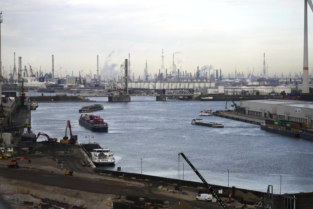 Ships move in the Port of Antwerp during a visit of the United States Secretary of Homeland Security Kristi Noem and Belgium's Prime Minister Bart De Wever in Antwerp, Belgium, Wednesday, Sept. 10, 2025. (AP Photo/Virginia Mayo)
