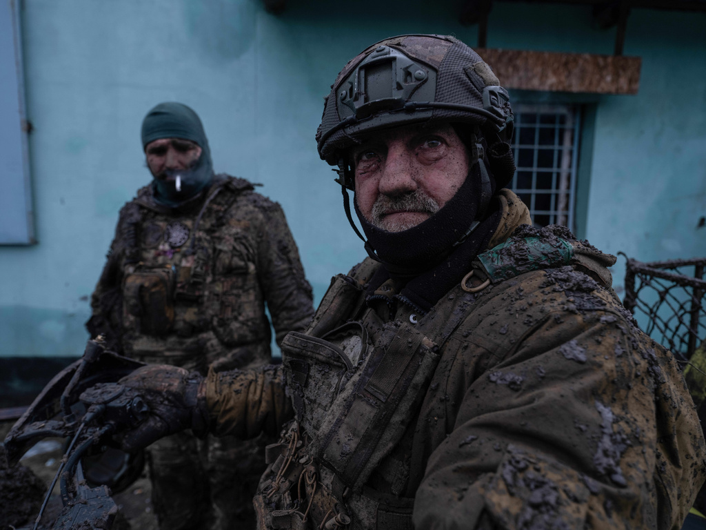 In this photo provided by Ukraine's 93rd Kholodnyi Yar Separate Mechanized Brigade press service, soldiers look on at the frontline in Donetsk region, Ukraine, Saturday, Jan. 31, 2026. (Iryna Rybakova/Ukraine's 93rd Mechanized Brigade via AP)