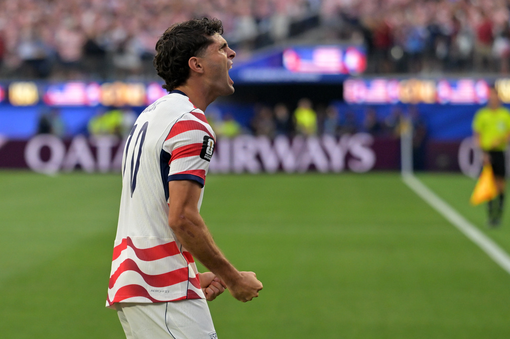 United States' Christian Pulisic celebrates after an own goal by Paraguay's Damian Bobadilla during the World Cup Group D soccer match in Inglewood, Calif., near Los Angeles, Friday, June 12, 2026. (AP Photo/Jayne Kamin-Oncea)
