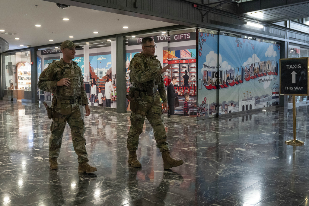 Members of the District of Columbia National Guard patrol the passengers area in Union Station, Tuesday, Sept. 2, 2025, in Washington. (AP Photo/Jose Luis Magana)