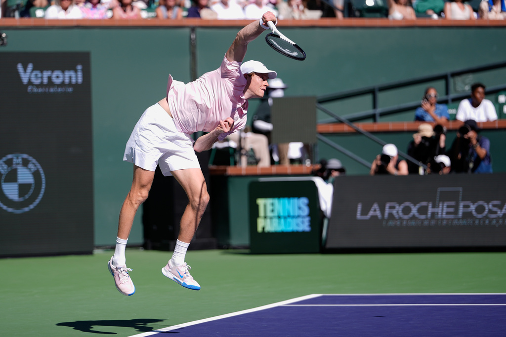 Jannik Sinner, of Italy, serves against Alexander Zverev, of Germany, during a semifinal match at the BNP Paribas Open tennis tournament, Saturday, March 14, 2026, in Indian Wells, Calif. (AP Photo/Mark J. Terrill)