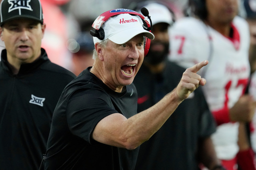 Houston head coach Willie Fritz celebrates a touchdown against Arizona State during the first half of an NCAA college football game Saturday, Oct. 25, 2025, in Tempe, Ariz. (AP Photo/Ross D. Franklin) Houston head coach Willie Fritz celebrates a touchdown against Arizona State during the first half of an NCAA college football game Saturday, Oct. 25, 2025, in Tempe, Ariz. (AP Photo/Ross D. Franklin)