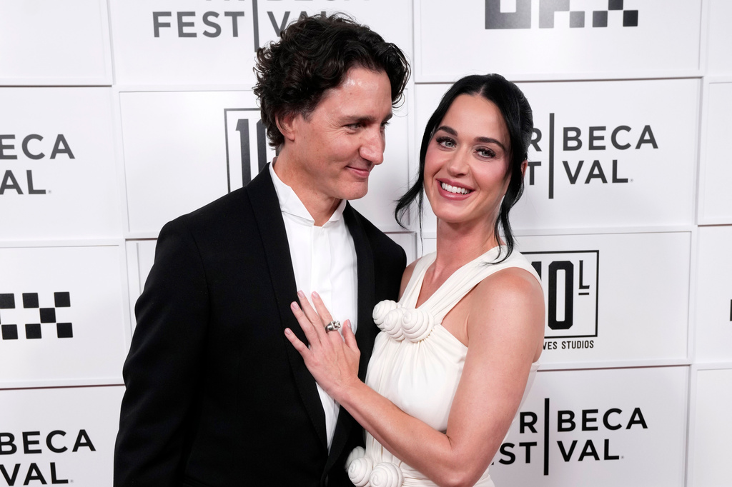 Justin Trudeau, left, and Katy Perry attend the "Katy Perry: The Lifetimes Tour - Live from Paris" world premiere at the OKX Theater at BMCC Tribeca Performing Arts Center during the Tribeca Festival on Monday, May 8, 2026, in New York. (Photo by Charles Sykes/Invision/AP)