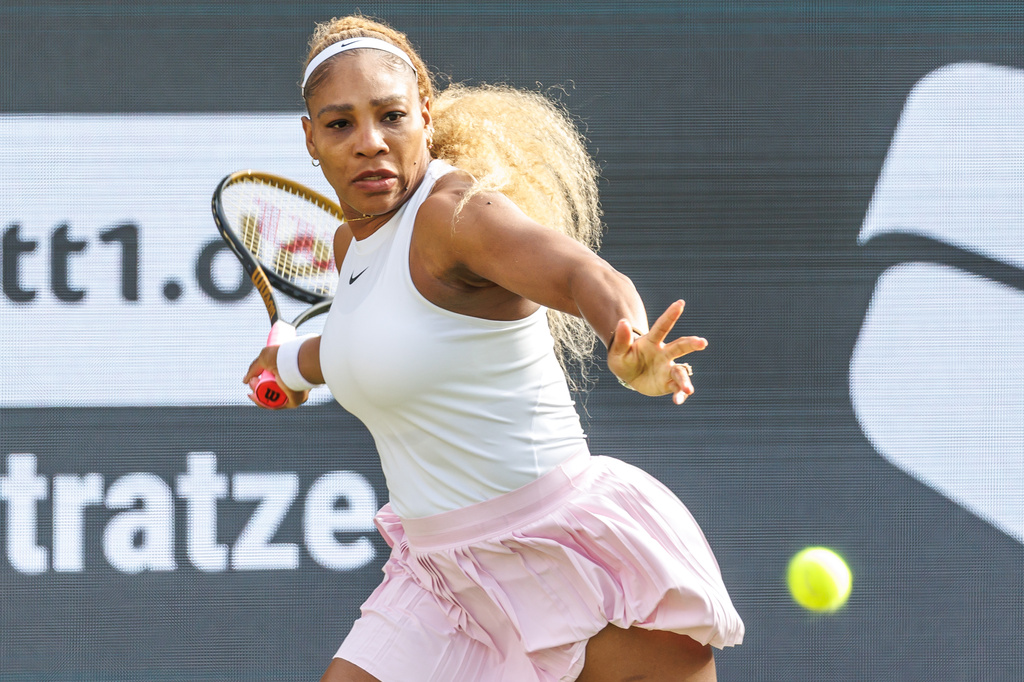 Serena Williams plays a forehand next to Karolina Muchova, not pictured, during first round women doubles tennis match against Routliffe and Olmos, in Berlin, Germany, Tuesday June 16, 2026. (Andreas Gora/dpa via AP)