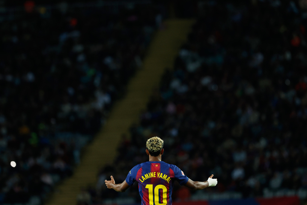 Barcelona's Lamine Yamal reacts during a Spanish La Liga soccer match between FC Barcelona and Real Sociedad at the Lluis Companys Olympic Stadium in Barcelona, Spain, Sunday, Sept. 28, 2025. (AP Photo/Joan Monfort)