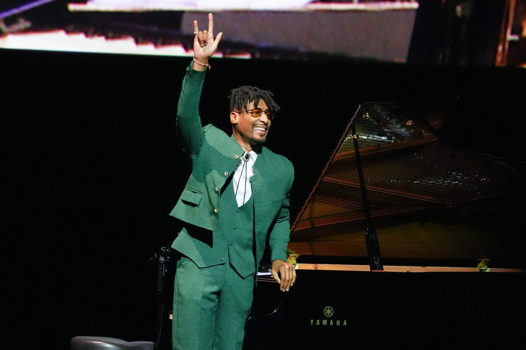 Jon Batiste performs during the Amazon MGM Studios presentation at CinemaCon on Wednesday, April 15, 2026, at Caesars Palace in Las Vegas. (AP Photo/Chris Pizzello)