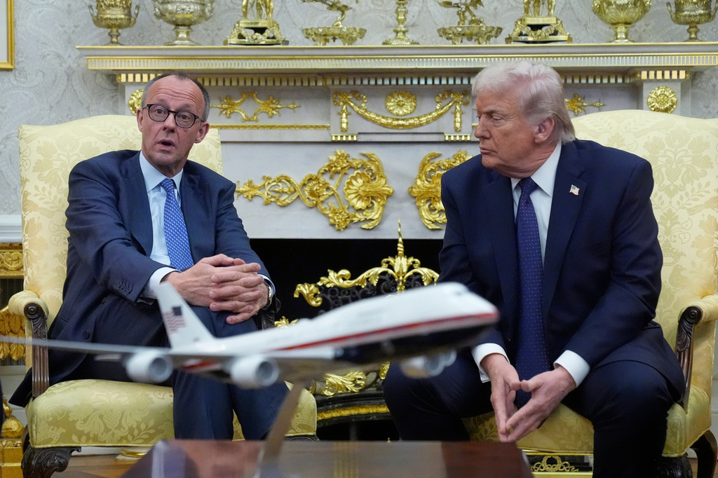 FILE - President Donald Trump meets with German Chancellor Friedrich Merz in the Oval Office at the White House, March 3, 2026, in Washington. (AP Photo/Mark Schiefelbein, File)