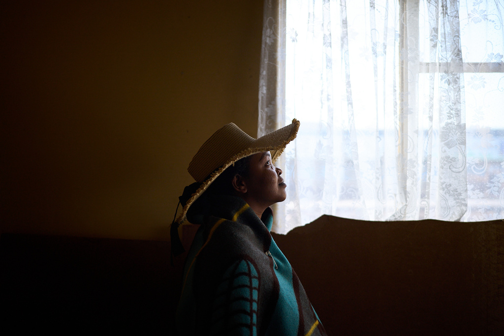 Evelin Kholeli, a massage therapist who is HIV-negative and lost access to the prevention medication known as PreP, poses for a portrait in Maputsoe, Lesotho, Thursday, July 17, 2025. Kholeli worked next door to a USAID-funded walk-in clinic that served people most vulnerable to HIV and AIDS. One day in January, she found the doors of the clinic closed without notice. "I would cry, I was praying that maybe after three months they would come back," she said. "Nothing happened." (AP Photo/Bram Janssen)