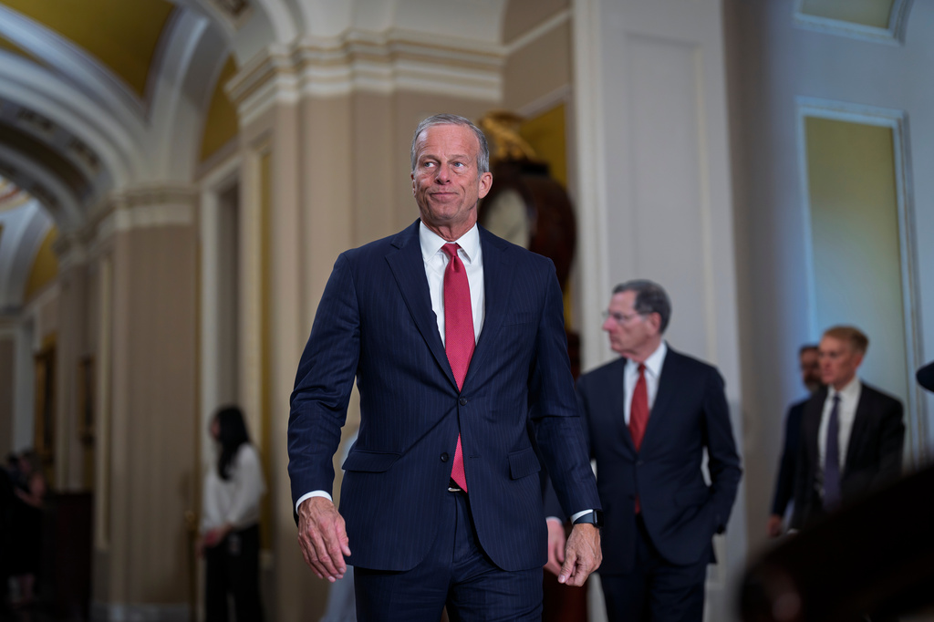 Senate Majority Leader John Thune, R-S.D., emerges from a closed-door party meeting to speaks with reporters, at the Capitol in Washington, Tuesday, April 21, 2026. (AP Photo/J. Scott Applewhite)