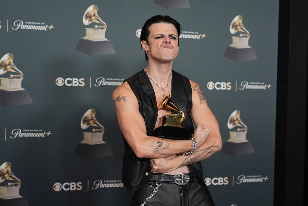 Yungblud poses in the press room with the award for best rock performance for "Changes (Live From Villa Park) Back To The Beginning" during the 68th annual Grammy Awards on Sunday, Feb. 1, 2026, in Los Angeles. (Photo by Richard Shotwell/Invision/AP)