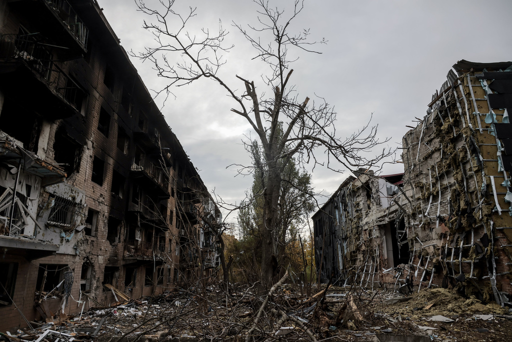 In this photo taken on Oct.13, 2025 and provided by Ukraine's 24th Mechanized Brigade press service, smoke raises amid the ruins in Kostiantynivka, a frontline town where some 5000 people still stay with no water, electricity and gas supply in the site of heaviest battles with the Russian troops in the Donetsk region, Ukraine. (Oleg Petrasiuk/Ukraine's 24th Mechanized Brigade via AP)
