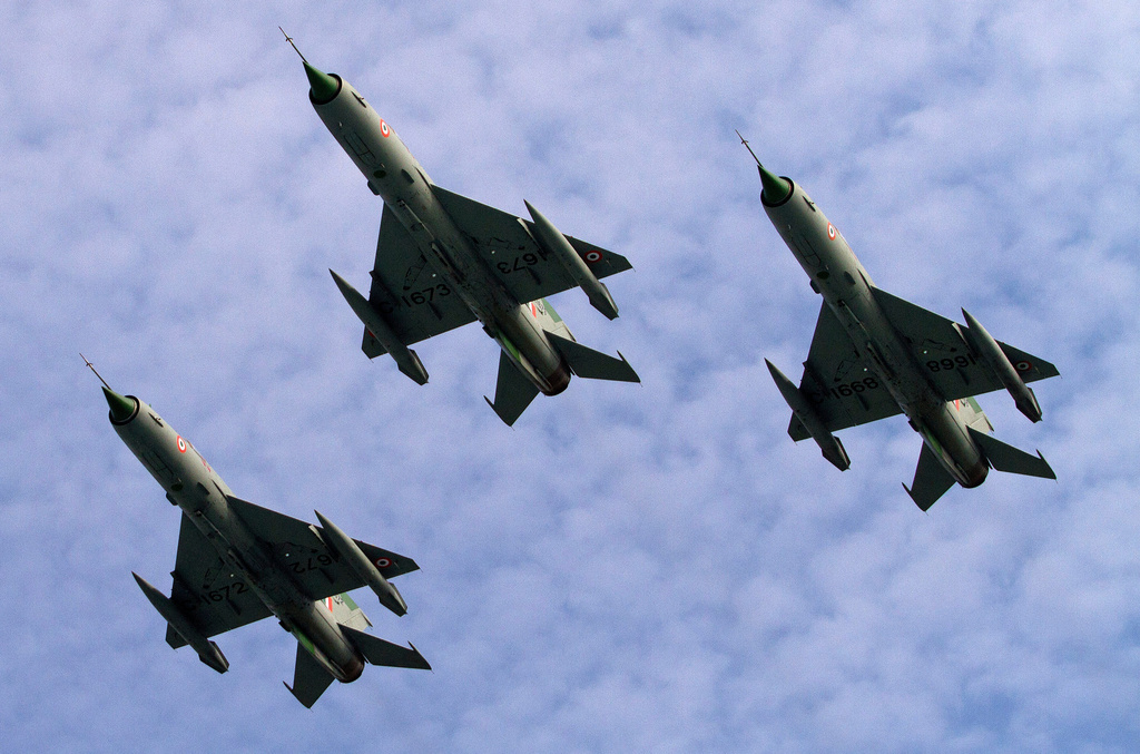 FILE -Indian Air Force (IAF) MIG 21 jet fighter aircrafts perform during a parade at an airbase in Tezpur, India, Nov. 21 2014. (AP Photo/Anupam Nath, File)