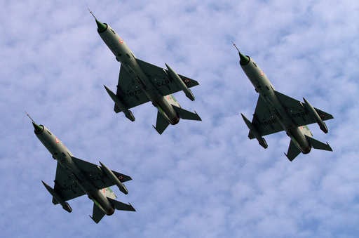 FILE -Indian Air Force (IAF) MIG 21 jet fighter aircrafts perform during a parade at an airbase in Tezpur, India, Nov. 21 2014. (AP Photo/Anupam Nath, File) FILE -Indian Air Force (IAF) MIG 21 jet fighter aircrafts perform during a parade at an airbase in Tezpur, India, Nov. 21 2014. (AP Photo/Anupam Nath, File)
