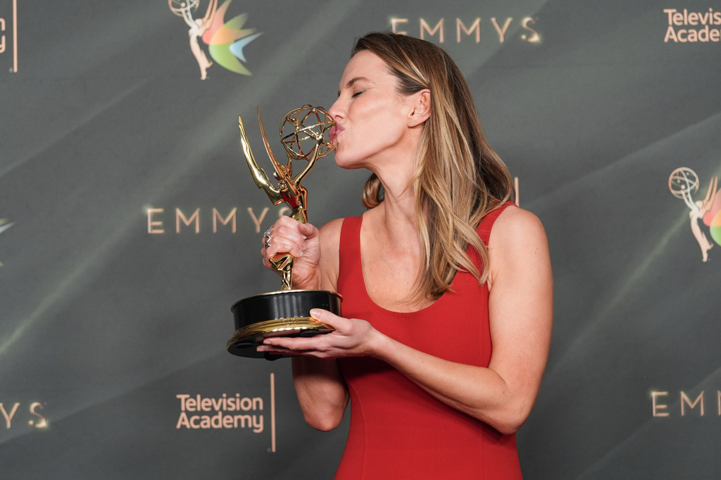 Betty Gilpin poses in the press room with the award for outstanding guest actress in a comedy series for "Widow's Bay" during night two of the Creative Arts Emmy Awards on Sunday, Sept. 6, 2026, in Los Angeles. (AP Photo/Chris Pizzello)