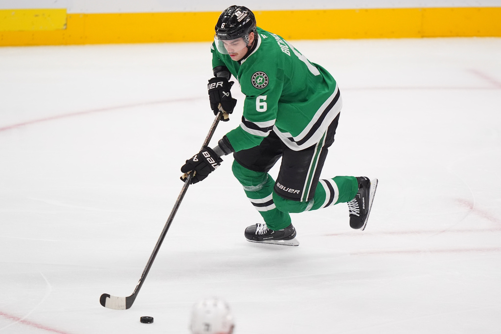 Dallas Stars defenseman Lian Bichsel (6) skates with the puck during the first period of an NHL hockey game against the Philadelphia Flyers, Saturday, Nov. 15, 2025, in Dallas. (AP Photo/LM Otero)