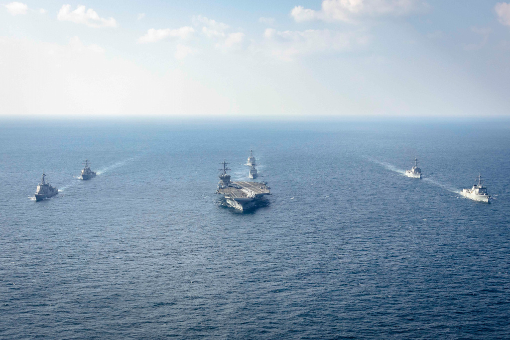 FILE - In this photo provided by South Korea Defense Ministry, warships of South Korea, the United States and Japan including the USS George Washington aircraft carrier, bottom center, take part in the trilateral Freedom Edge exercise in international waters off South Korea's southern island of Jeju, on Nov. 13, 2024. (South Korea Defense Ministry via AP, File)