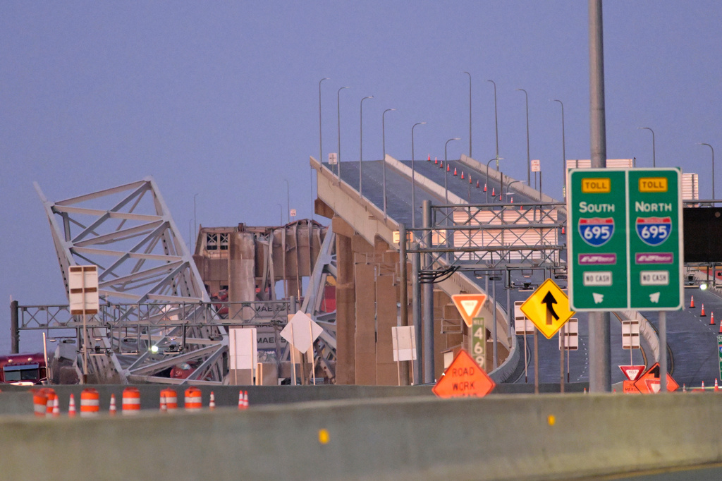 FILE - Parts of the Francis Scott Key Bridge remain after a container ship collided with a support, March 26, 2024 in Baltimore. (AP Photo/Steve Ruark, File)