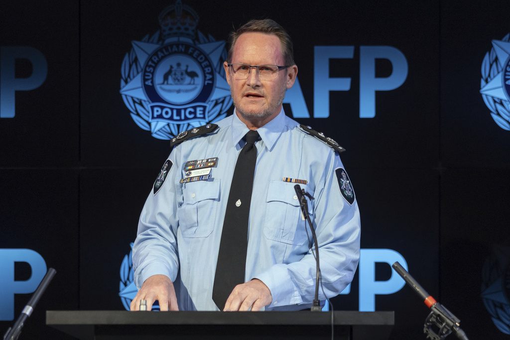 In this photo provided by the Australian Federal Police, Assistant Commissioner for Counterterrorism and Special Investigations Stephen Nutt speaks in Canberra, on Monday, Aug. 4, 2025, about a Chinese national being charged under Australia's foreign interference laws. (Australian Federal Police via AP)