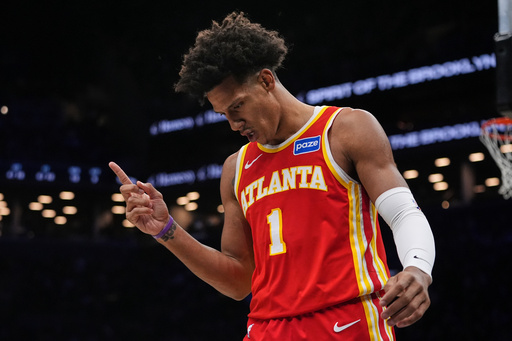 Atlanta Hawks' Jalen Johnson (1) gestures after drawing a fould during the first half of an NBA basketball game against the Brooklyn Nets Wednesday, Oct. 29, 2025, at Barclays Center in New York. (AP Photo/Frank Franklin II) Atlanta Hawks' Jalen Johnson (1) gestures after drawing a fould during the first half of an NBA basketball game against the Brooklyn Nets Wednesday, Oct. 29, 2025, at Barclays Center in New York. (AP Photo/Frank Franklin II)