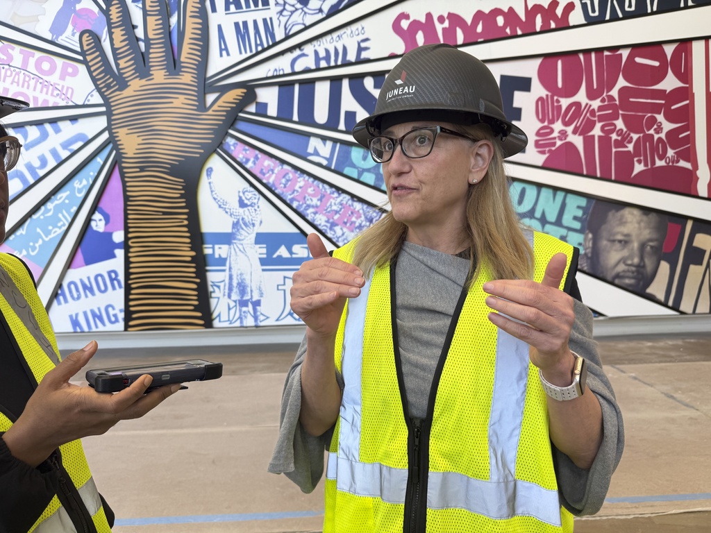 Jill Savitt, president and CEO of The National Center for Civil and Human Rights, describes the museum's expansion during a hard-hat tour, Wednesday, Sept. 10 in Atlanta. (AP Photo/Michael Warren)